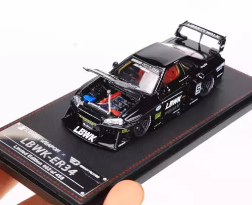 1:64 diecast racing sports car model, black ER34 with open engine bay and rear wing