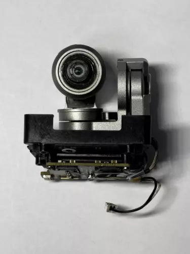 Drone camera gimbal assembly with lens, mounting bracket, and attached cable