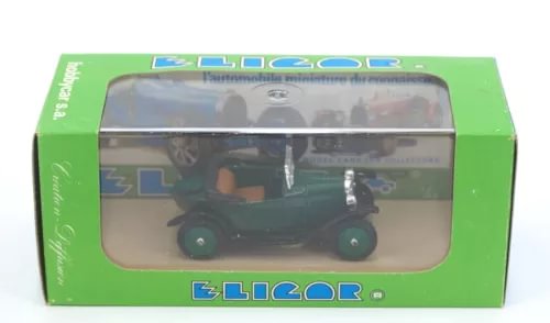 1:43 scale diecast cabriolet model car in dark green with tan interior, in display box