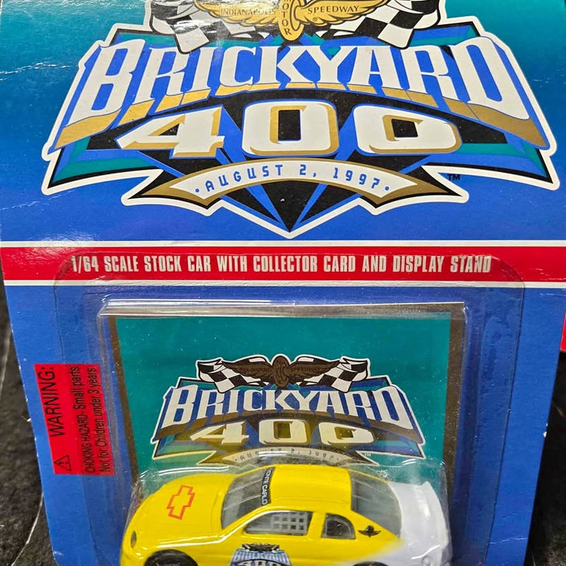 Brickyard 400 1/64 stock car diecast in retail box with blister card and stand