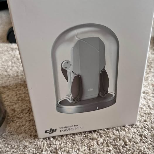 DJI Mini charging base with open cradle for drone batteries