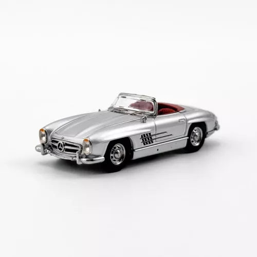 Silver Mercedes-Benz 300SL roadster diecast model car, open-top with red interior