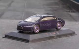 Purple diecast sports car model on dark display base, front three-quarter view