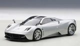 Metallic silver diecast sports car model, front 3/4 view, black grille