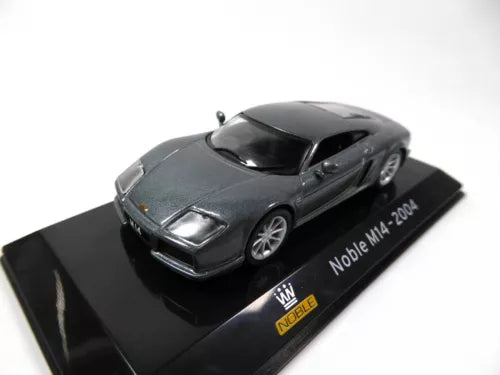 Diecast supercar model with dark gray Noble M14 2004 coupe, front 3/4 view on black base