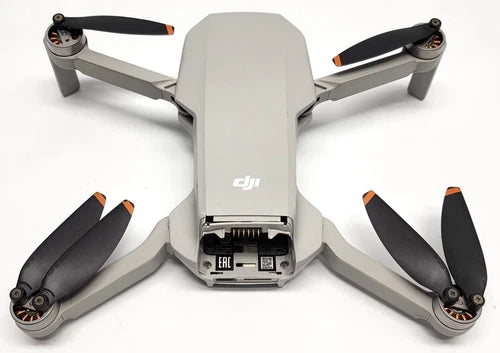 DJI Mini 2 drone quadcopter aircraft body with four propellers, front view