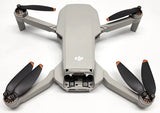 DJI Mini 2 drone quadcopter aircraft body with four propellers, front view