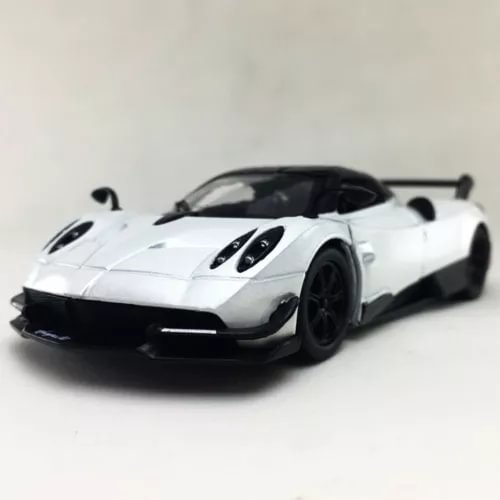 White diecast sports car model with black accents, rear wing and detailed wheels
