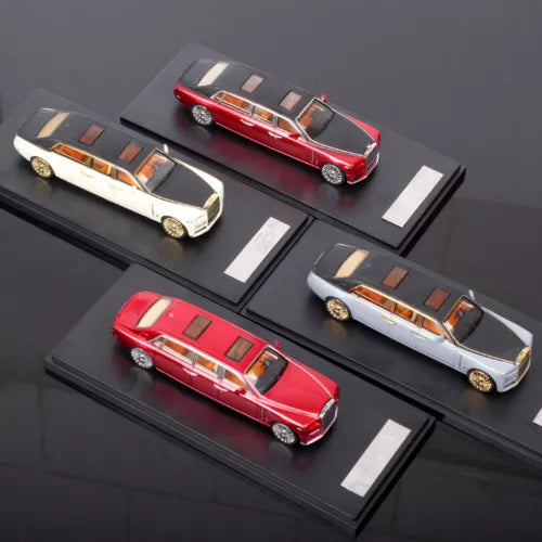 1:64 diecast model car display with red and white Phantom Extended Edition cars