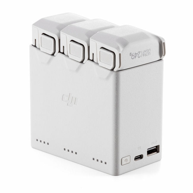 DJI battery charger hub with three battery slots and USB-C port, white