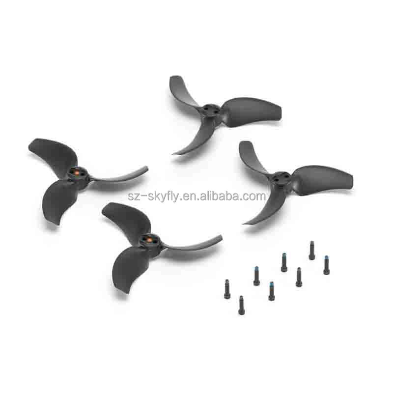 Drone propeller set with three black blades and mounting screws