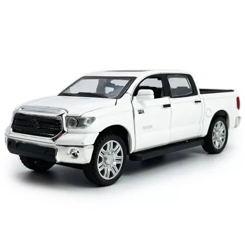 White 1:36 scale diecast pickup truck model car with detailed grille and headlights