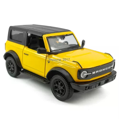 Yellow 2-door Bronco diecast model car toy with black roof and front grille