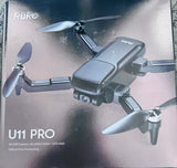 Foldable remote control camera drone with dark gray body and four prop blades