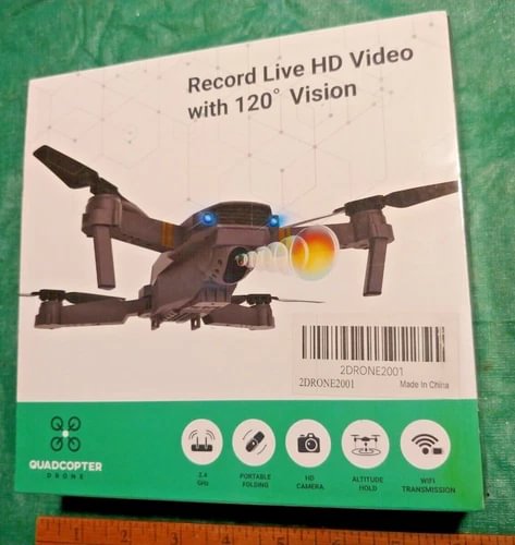 Black quadcopter drone with front camera lens and four propellers
