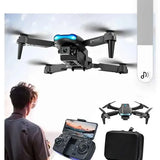 Mini quadcopter drone with blue LED lights and front camera, four propellers