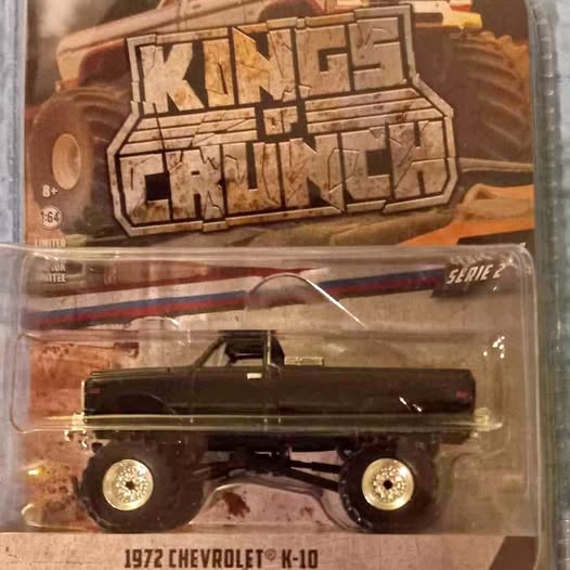 1:64 diecast 1972 Chevrolet K-10 truck, black with gold wheels