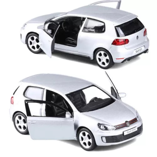 White die-cast VW Golf 6 model car with open doors and black interior, 1:36 scale.