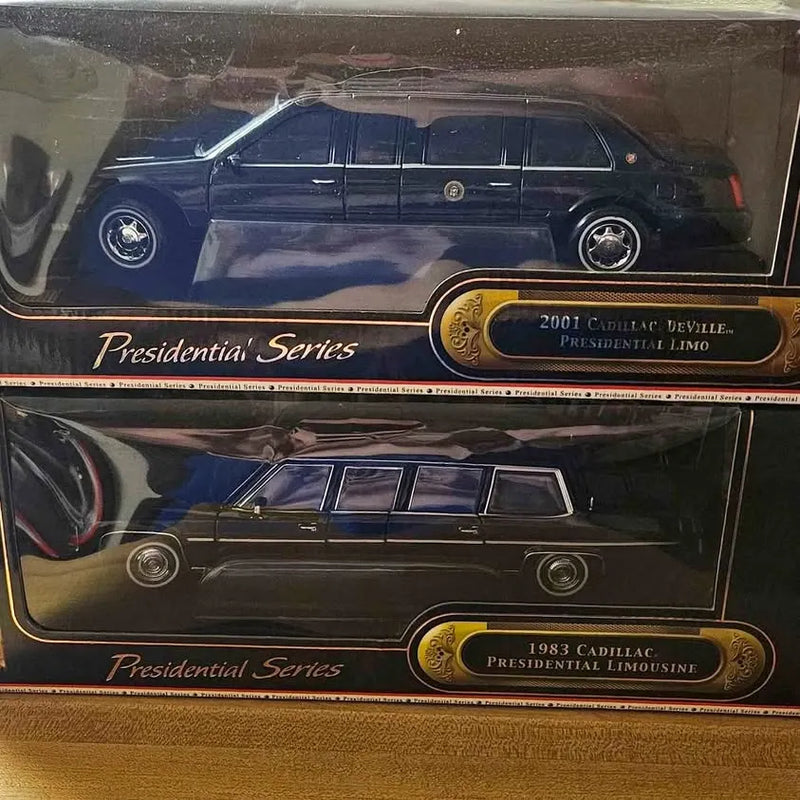 Blue diecast sedan models in display box, Presidential Series (front view).