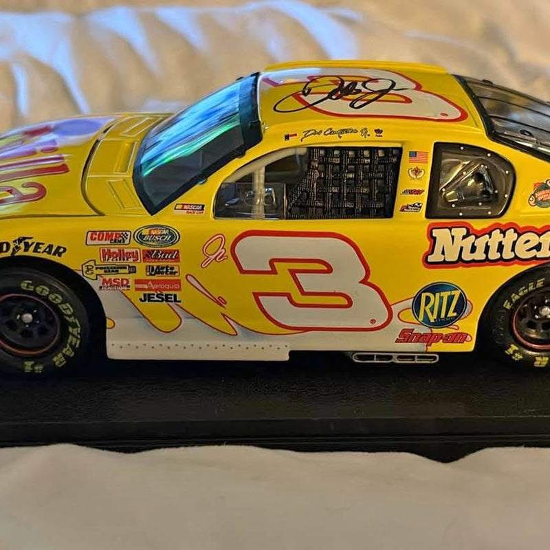 1/24 NASCAR diecast race car, yellow and white #3 with sponsor logos