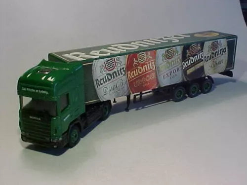 Mint green diecast truck model with multi-logo box trailer