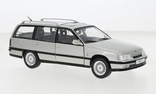 Light grey station wagon diecast model car, 1:24 scale