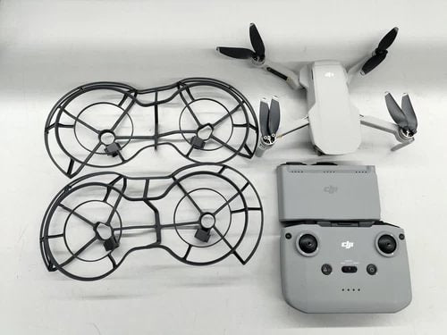 Foldable quadcopter drone with controller and propeller guards