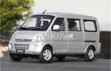Silver diecast MPV van model car, front-left view with detailed grille and wheels