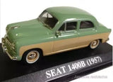 Green and beige classic sedan diecast model on black display base, white label
