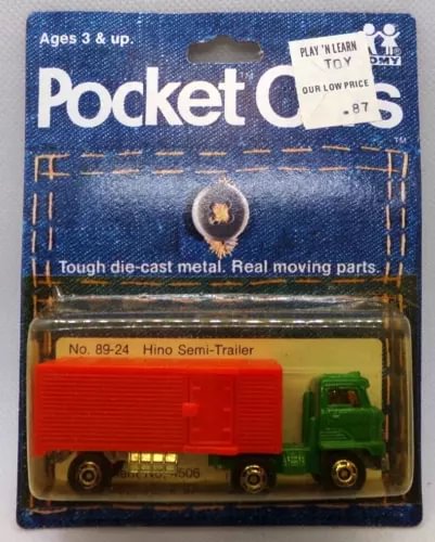 1:64 diecast Hino semi-truck with green cab and red trailer, pocket car size
