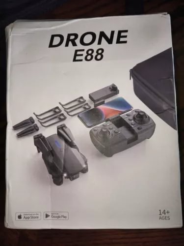 Drone E88 box packaging with pictured quadcopter and controller, 14+ ages label