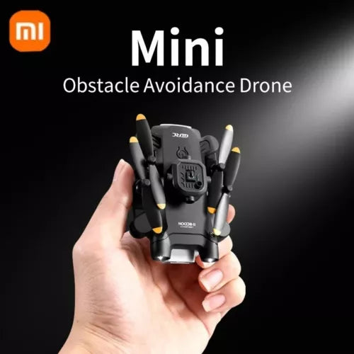XIAOMI mini quadcopter drone with camera, black body, four arms and yellow prop tips.