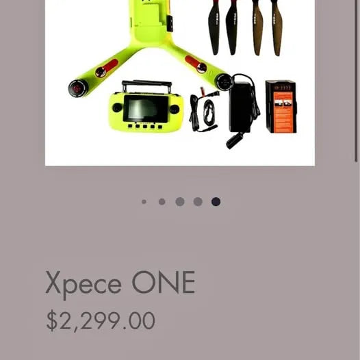 Green quadcopter drone with front camera and attached display screen