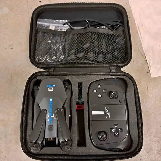 Drone aircraft carry case with folded drone and controller inside