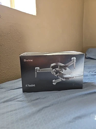 F7MINI mini drone retail box with drone render