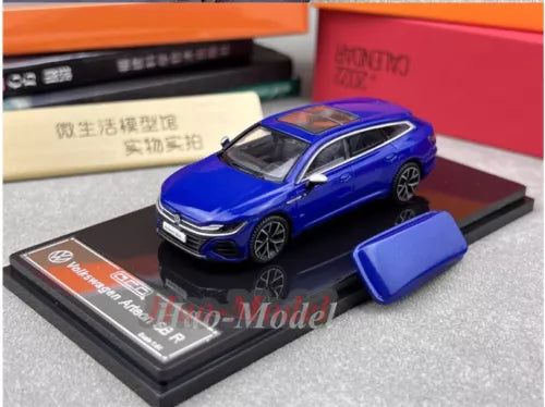 Blue Volkswagen Arteon R diecast model car with detailed front on black display base