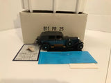 Diecast model car in dark teal, with papers; for parts or repair