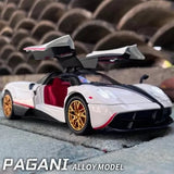 Diecast racing model car, white with black accents, red interior, gold wheels