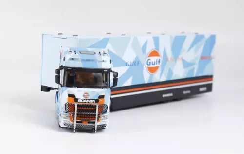 Blue diecast enclosed double deck truck model with Scania grille and front cab