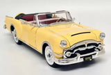 Yellow Packard Caribbean 1953 diecast scale model car with chrome grille