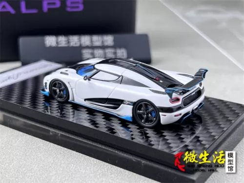 1:64 scale white racing sports diecast model car with rear spoiler on base