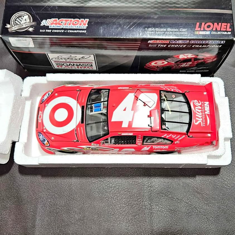 Red diecast race car with #4 on hood and side, detailed cockpit and decals