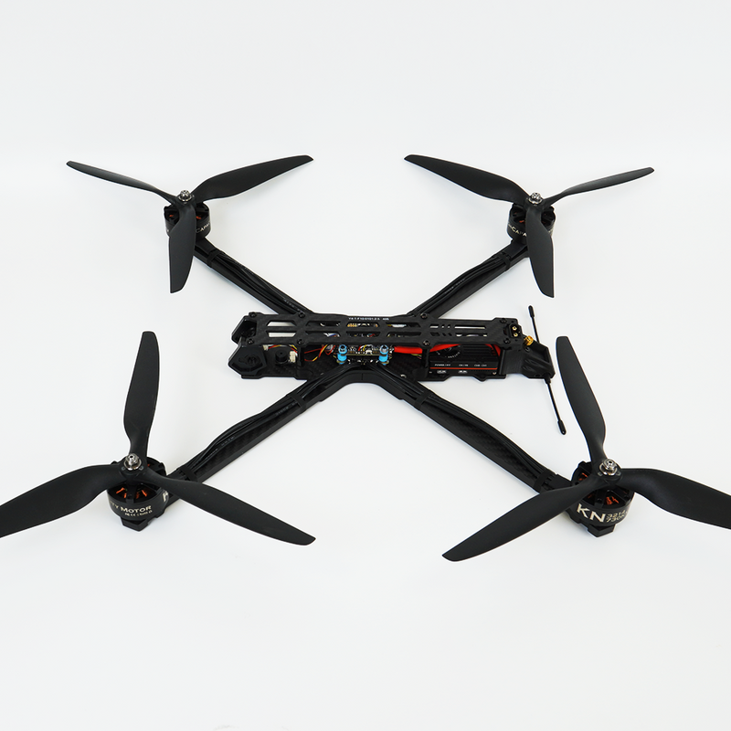 Carbon fiber quadcopter drone with four propellers and central camera
