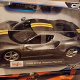 Silver diecast sports car model with yellow stripe and Ferrari-style prancing badge