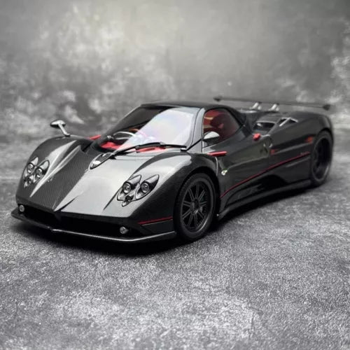 1/18 diecast model car, black and silver with carbon-look hood details
