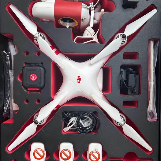 DJI Phantom 2 Vision Plus quadcopter drone with red and white propellers