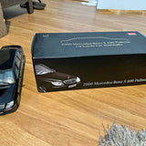 Diecast car set, metallic black Mercedes S 600 Pullman in box, front view