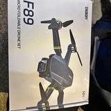 Long-range HD camera drone box, gray quadcopter illustration with camera