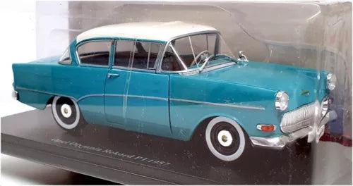 Blue and white 1957 Opel Olympia Rekord diecast car model with wheels and chrome grille