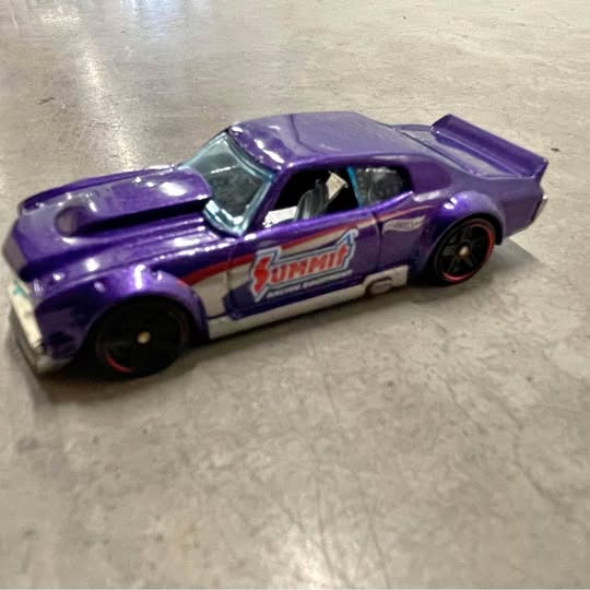 Purple 1970 muscle car die-cast with Sunfire side decal and black wheels